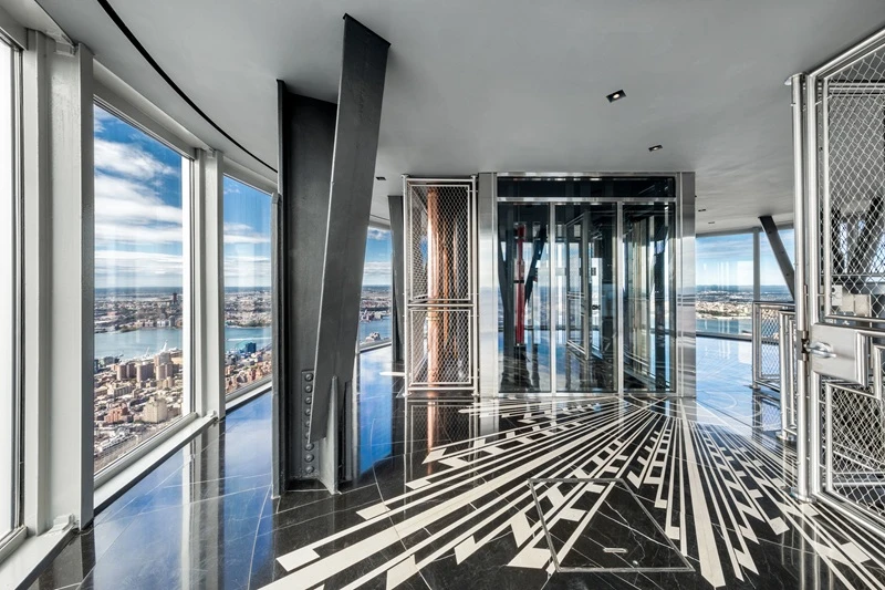 Fire-rated glass door with narrow-profile framing installed at Costco Headquarters, enhancing visibility and meeting fire safety standards.